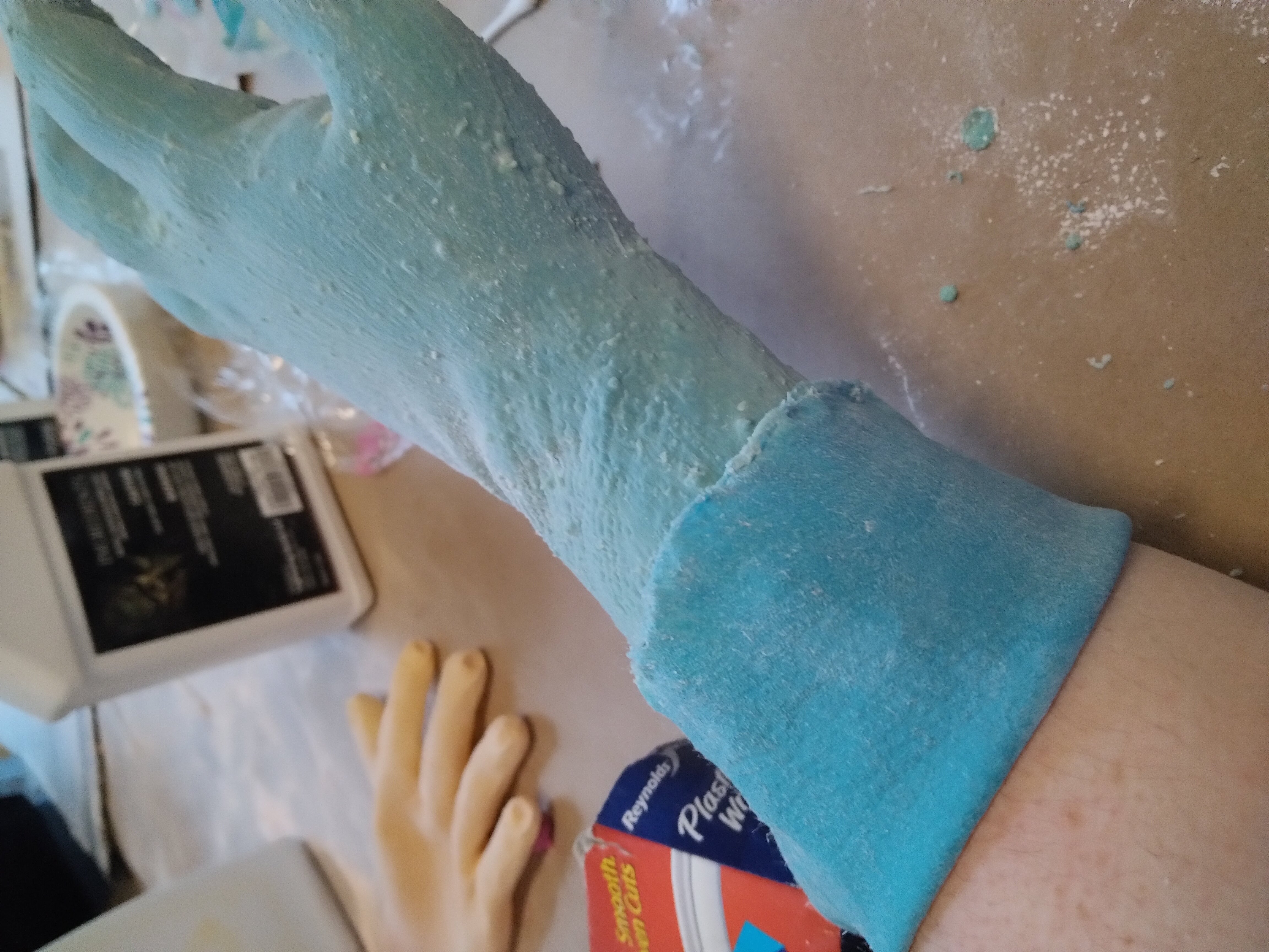 Winter 2022: Constructed a fake arm using liquid latex. Took it off gently using baby oil to loosen the edges.