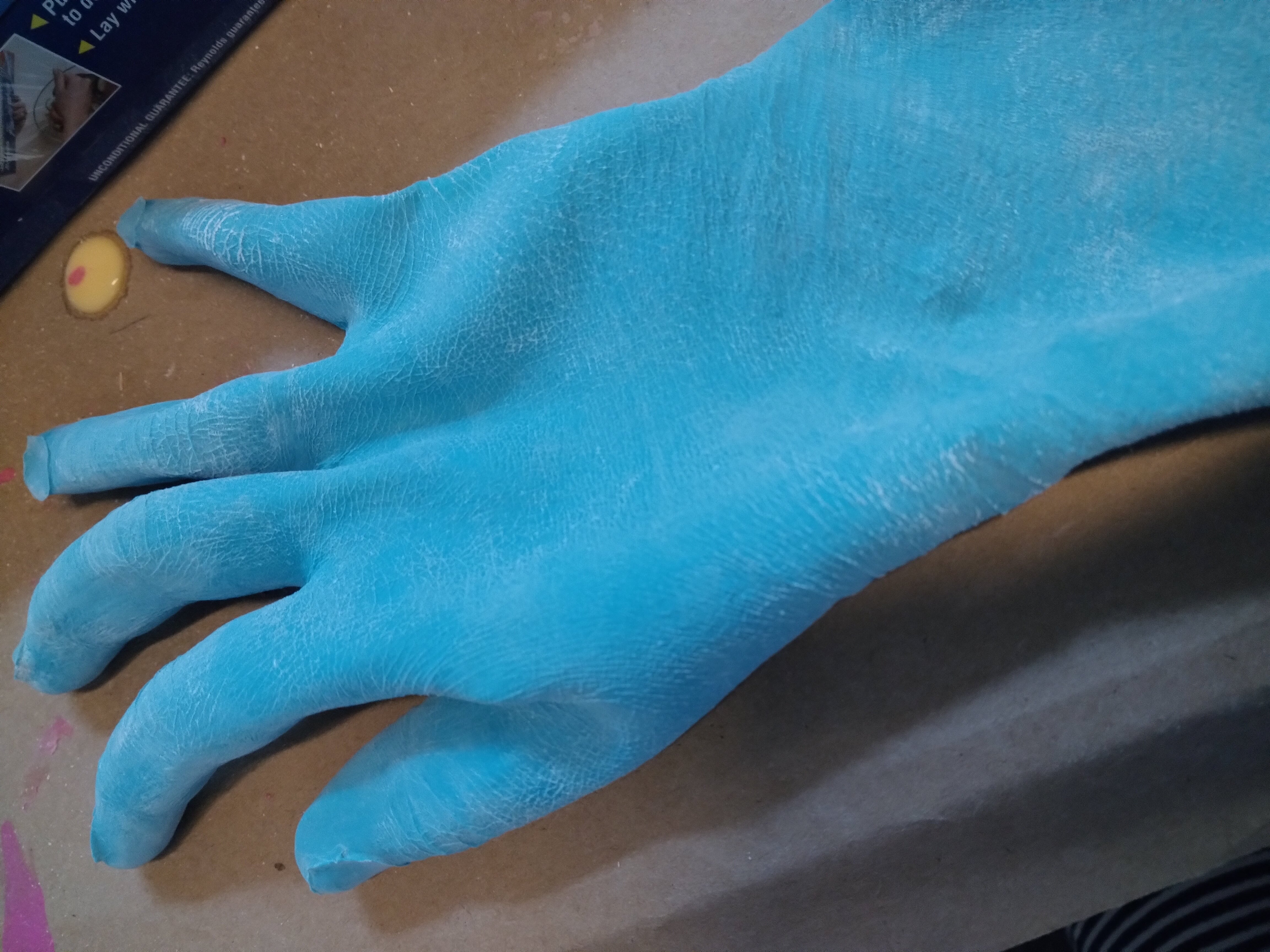 Winter 2022: Constructed a fake arm using liquid latex. This is the arm immediately after removing.